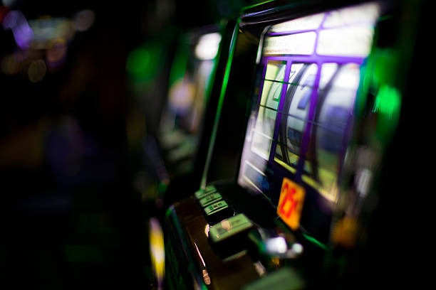 Live Andar Bahar table with professional dealer, reference card, and betting layout